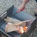 Look inside the Portable Fire Pit with logs